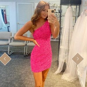 Hot Pink sequin one shoulder homecoming dress.
